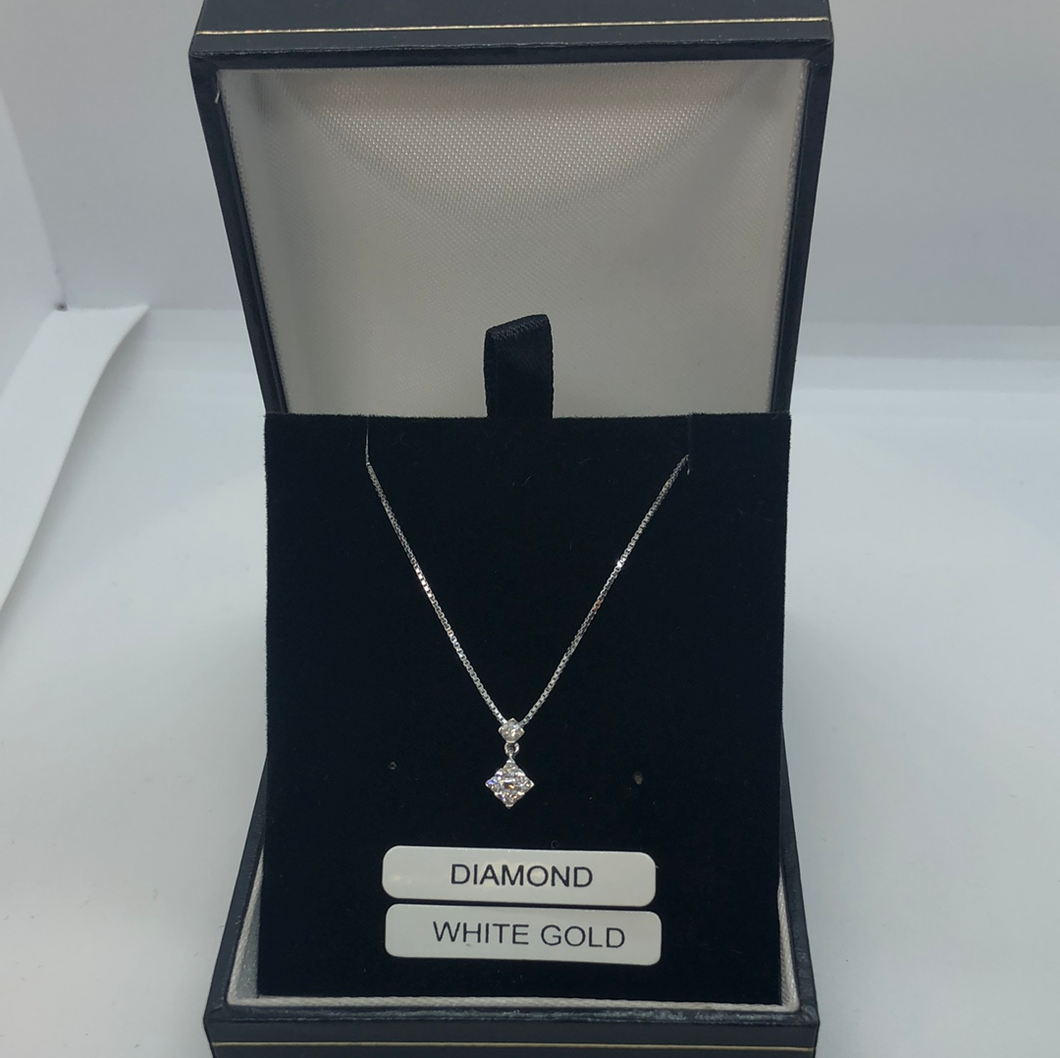 White gold and diamond pendant and chain