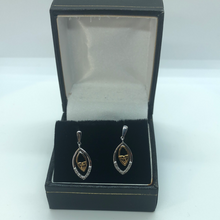 Load image into Gallery viewer, White gold , yellow gold and diamond Celtic Knot earrings
