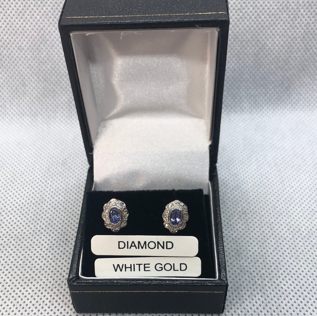 White gold diamond and Amythest earrings