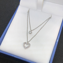 Load image into Gallery viewer, Sterling silver and cubic zirconia heart pendant with double chain
